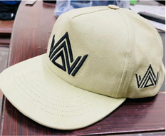 Cotton, velvet, suede, and denim trucker cap examples from the catalogue